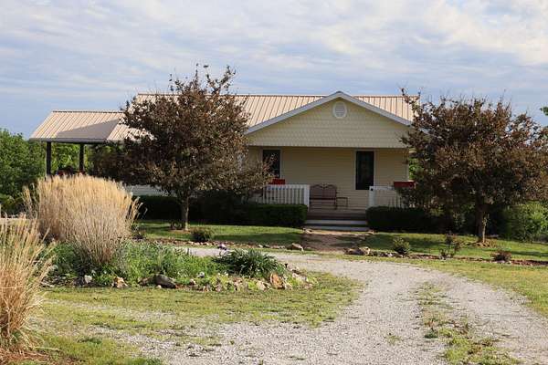 38.3 Acres of Land with Home for Sale in Hartville, Missouri
