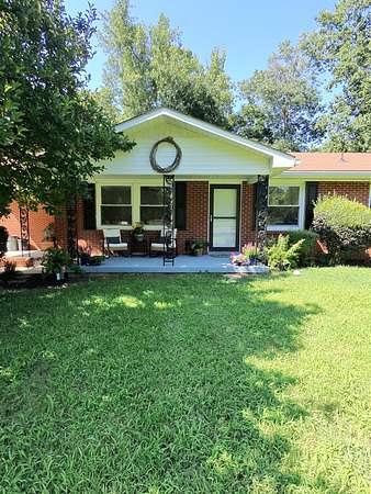 8.57 Acres of Land with Home for Sale in Burns, Tennessee