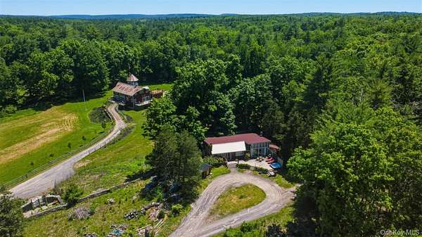 7.84 Acres of Land with Home for Sale in Woodstock, New York