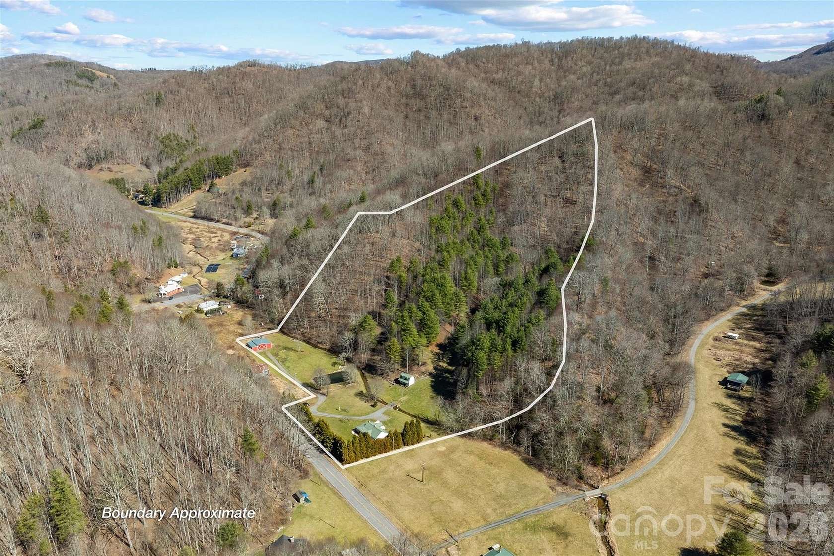 19.2 Acres of Land with Home for Sale in Mars Hill, North Carolina