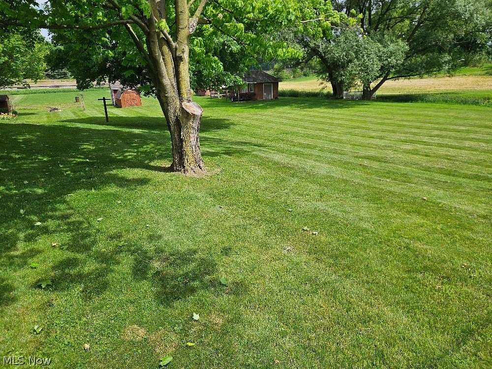 2.74 Acres of Land with Home for Auction in Minerva, Ohio