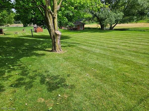 2.74 Acres of Land with Home for Auction in Minerva, Ohio