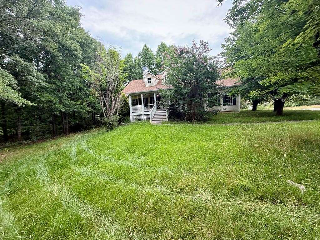 3.27 Acres of Land with Home for Sale in Loganville, Georgia