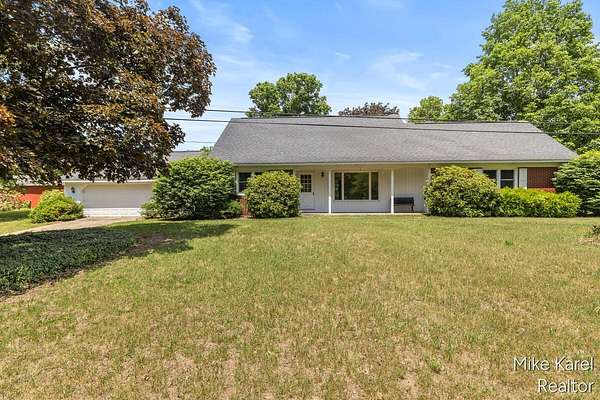 3.87 Acres of Land with Home for Sale in Dorr, Michigan