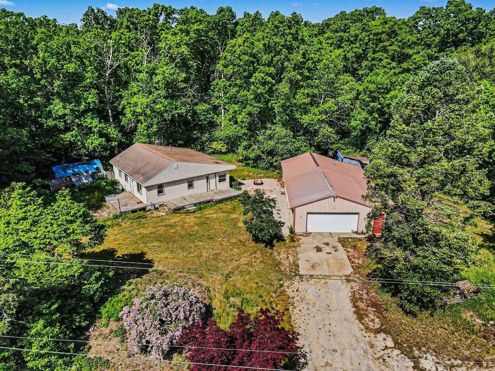 5.1 Acres of Land with Home for Sale in Montague, Michigan