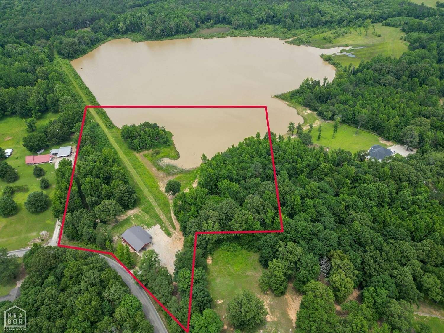 10 Acres of Land with Home for Sale in Jonesboro, Arkansas