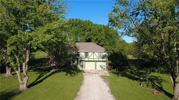 5 Acres of Land with Home for Sale in Raymore, Missouri