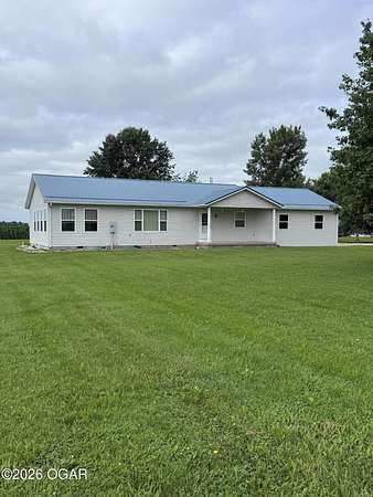 2.86 Acres of Land with Home for Sale in Stark City, Missouri