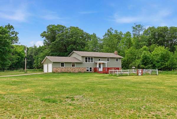 3.9 Acres of Land with Home for Sale in Zimmerman, Minnesota
