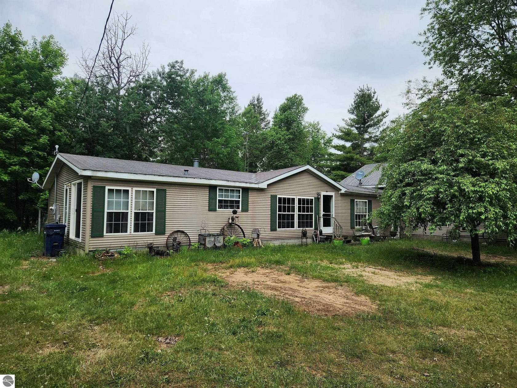 24 Acres of Land with Home for Sale in Kalkaska, Michigan