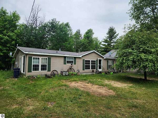 24 Acres of Land with Home for Sale in Kalkaska, Michigan