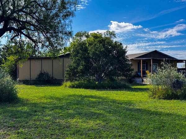 5 Acres of Land with Home for Sale in Llano, Texas