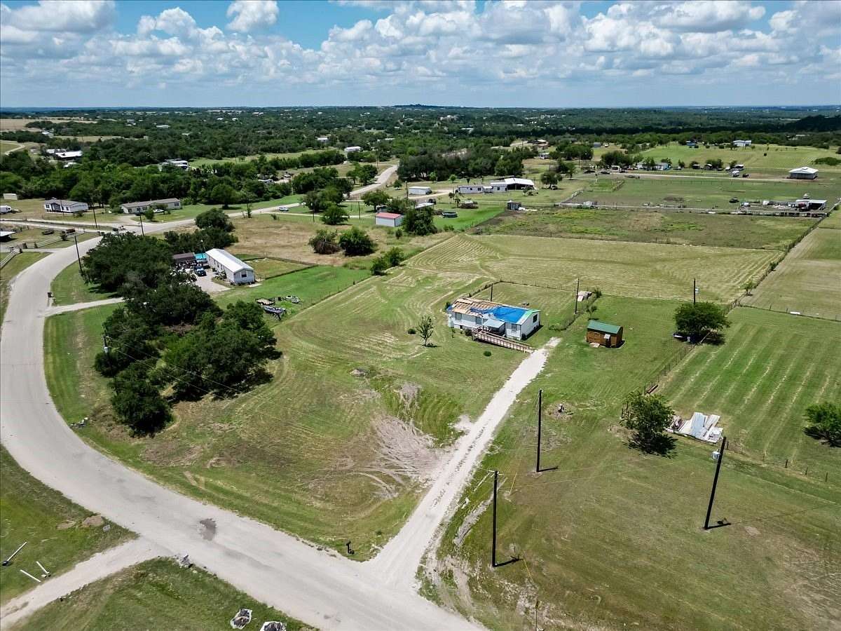 2.57 Acres of Land with Home for Sale in Springtown, Texas