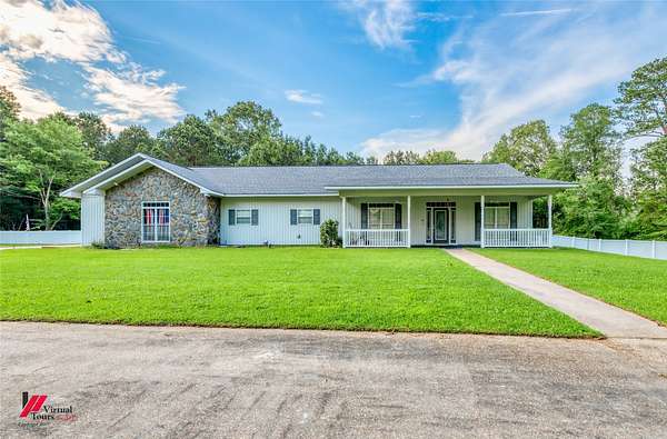 14.7 Acres of Land with Home for Sale in Springhill, Louisiana