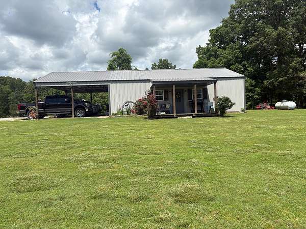 5 Acres of Land with Home for Sale in Maynard, Arkansas