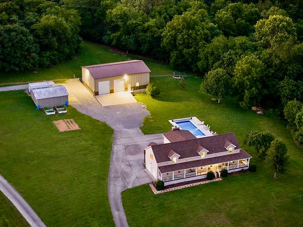 5.7 Acres of Land with Home for Sale in Alexandria, Tennessee