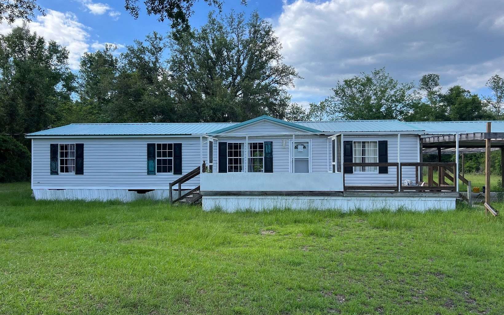 10 Acres of Land with Home for Sale in Live Oak, Florida