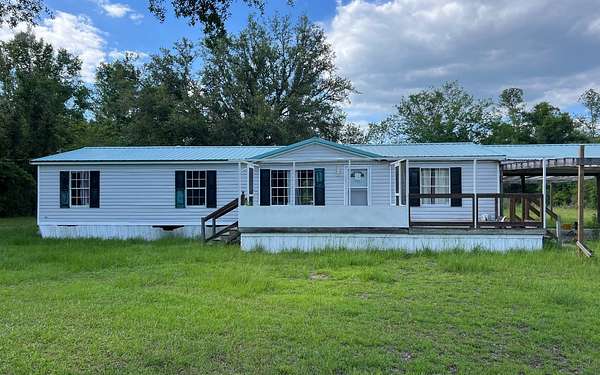 10 Acres of Land with Home for Sale in Live Oak, Florida