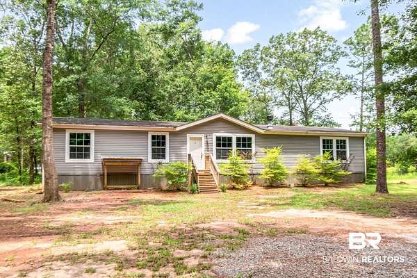 1.64 Acres of Land with Home for Sale in Loxley, Alabama