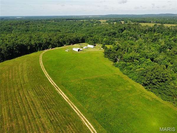 49 Acres of Land with Home for Sale in Arlington Township, Missouri