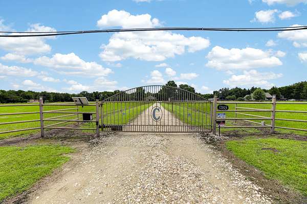10.5 Acres of Land with Home for Sale in Quinlan, Texas