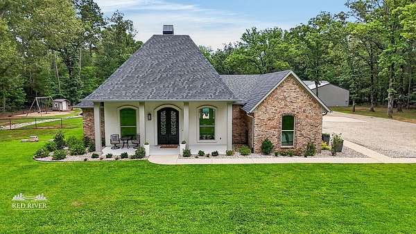 6.68 Acres of Land with Home for Sale in Shreveport, Louisiana
