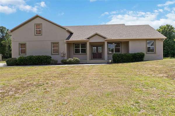 2.38 Acres of Land with Home for Sale in St. Cloud, Florida