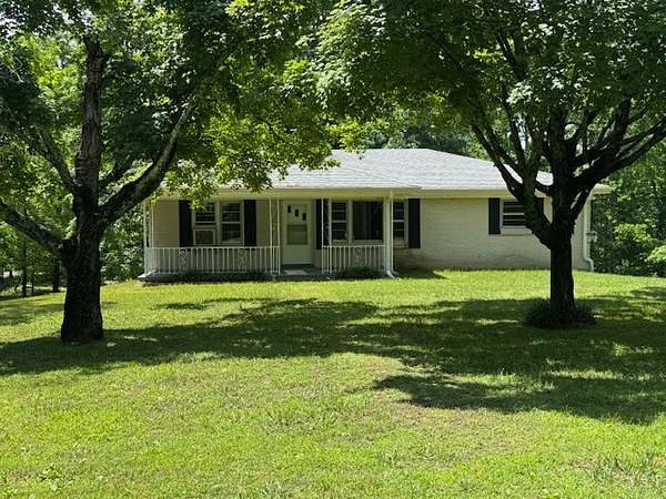 1.6 Acres of Land with Home for Auction in Bon Aqua, Tennessee