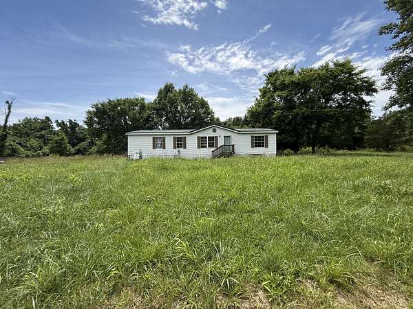 5 Acres of Land with Home for Sale in Cumberland Furnace, Tennessee
