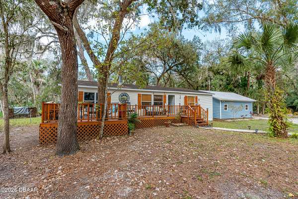 2.5 Acres of Land with Home for Sale in Edgewater, Florida