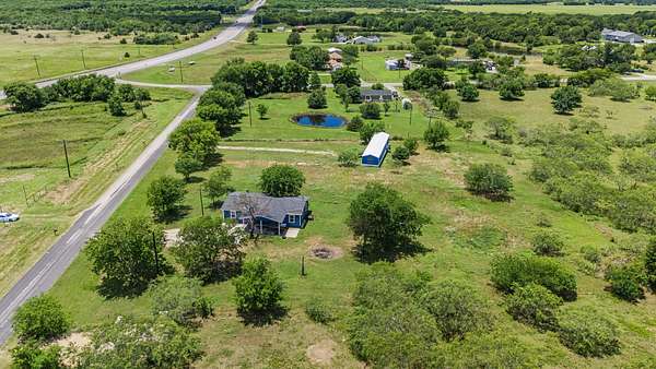 2.49 Acres of Land with Home for Sale in Royse City, Texas