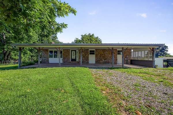 7 Acres of Land with Home for Sale in Rock Island, Tennessee