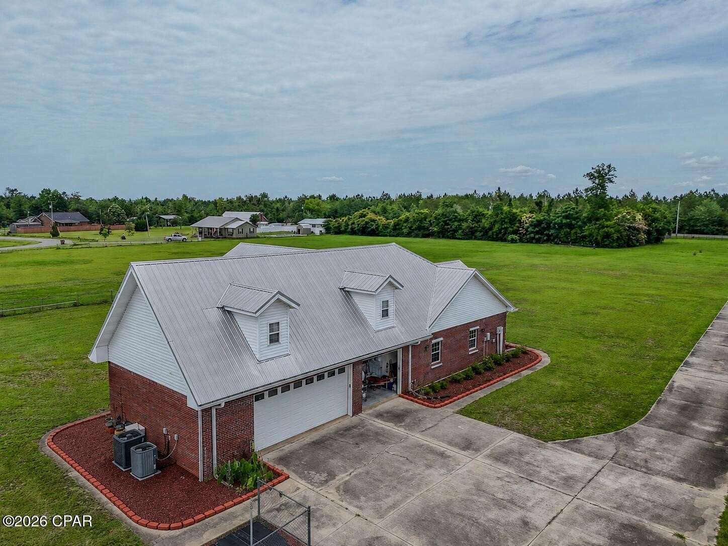 6.29 Acres of Land with Home for Sale in Altha, Florida