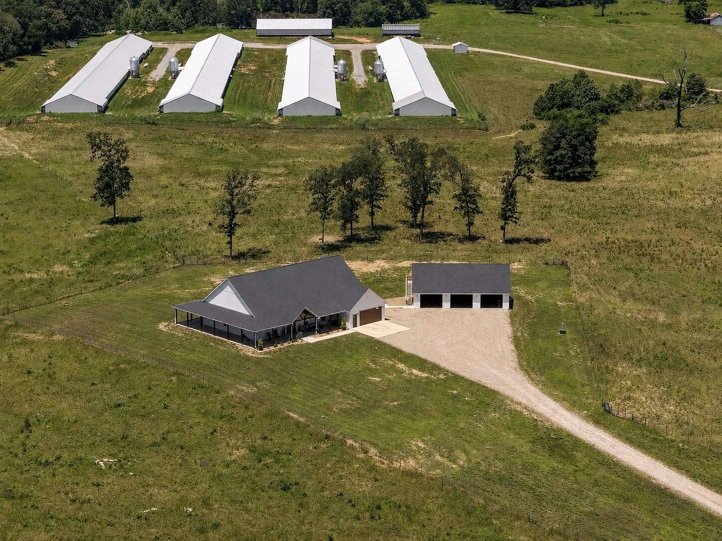 239 Acres of Agricultural Land with Home for Sale in Doniphan, Missouri