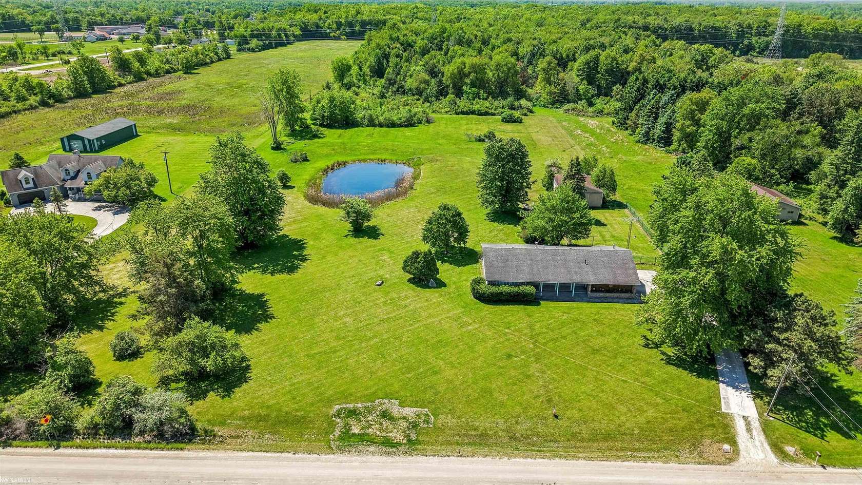 5 Acres of Land with Home for Sale in Lenox Township, Michigan