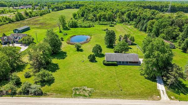 5 Acres of Land with Home for Sale in Lenox Township, Michigan