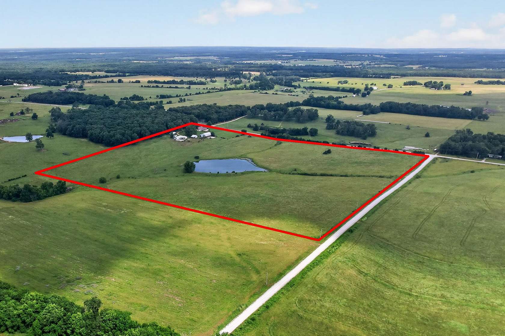 39.1 Acres of Agricultural Land with Home for Sale in Conway, Missouri