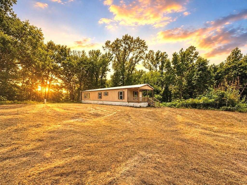 38.5 Acres of Agricultural Land with Home for Sale in Palestine, Texas