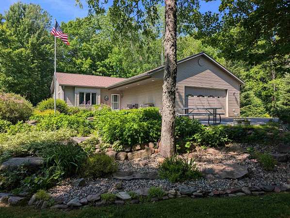 10 Acres of Recreational Land with Home for Sale in Hatley, Wisconsin
