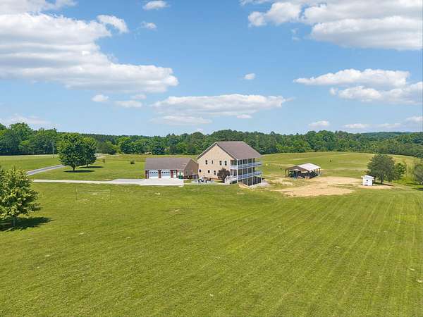 13.2 Acres of Land with Home for Sale in Etowah, Tennessee