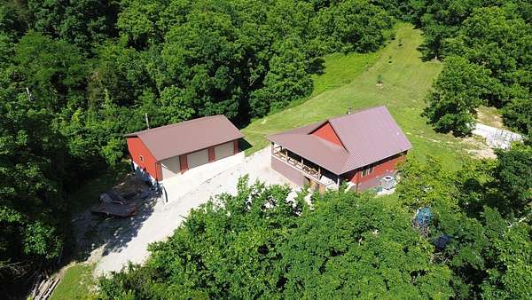 118 Acres of Recreational Land with Home for Sale in Burkesville, Kentucky