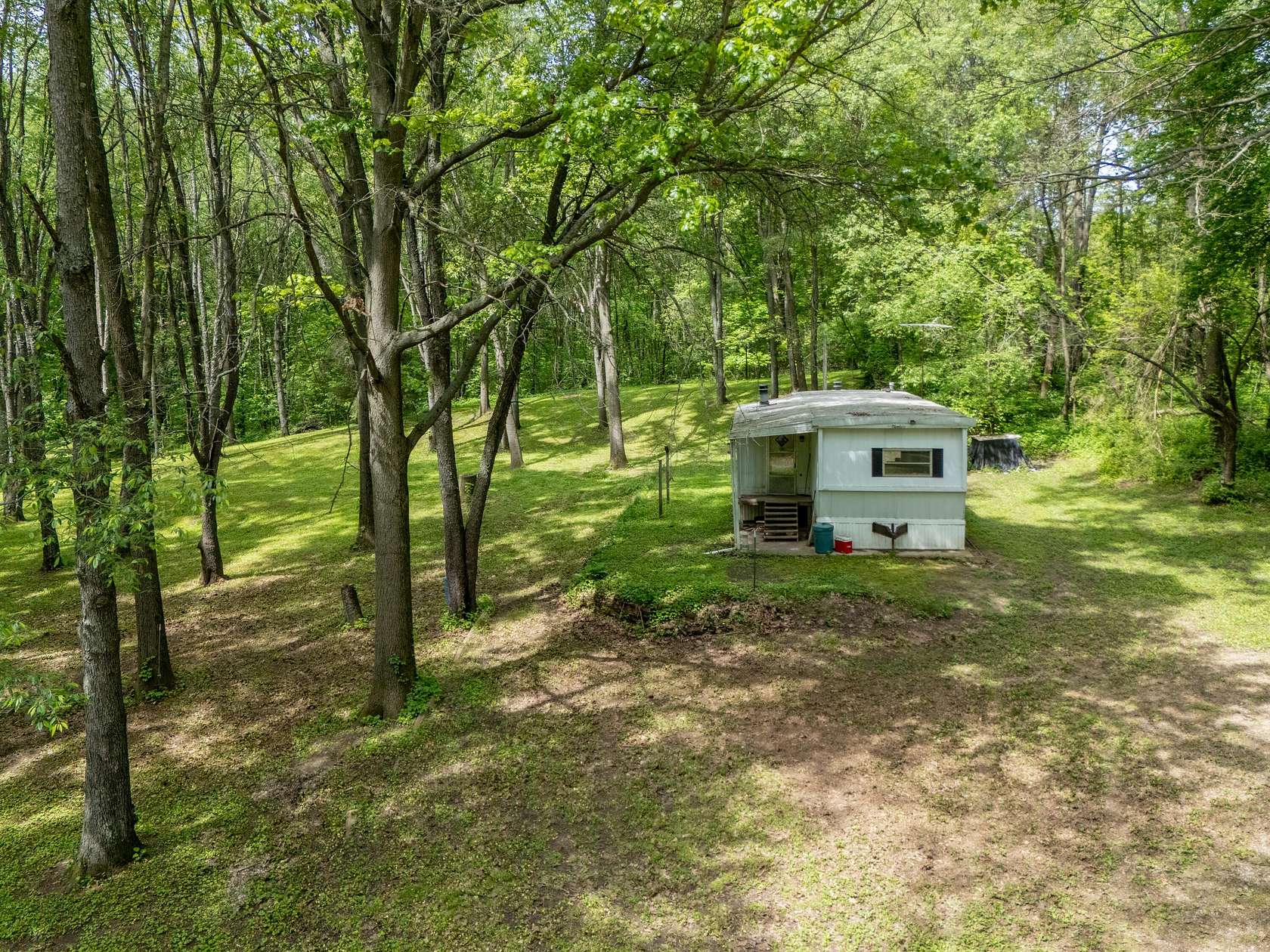 4.38 Acres of Land with Home for Sale in Delton, Michigan