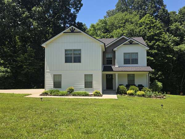 3.33 Acres of Land with Home for Sale in Palmyra, Tennessee