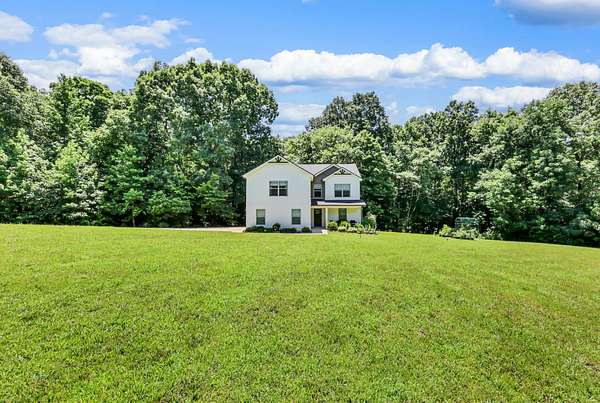 3.33 Acres of Land with Home for Sale in Palmyra, Tennessee