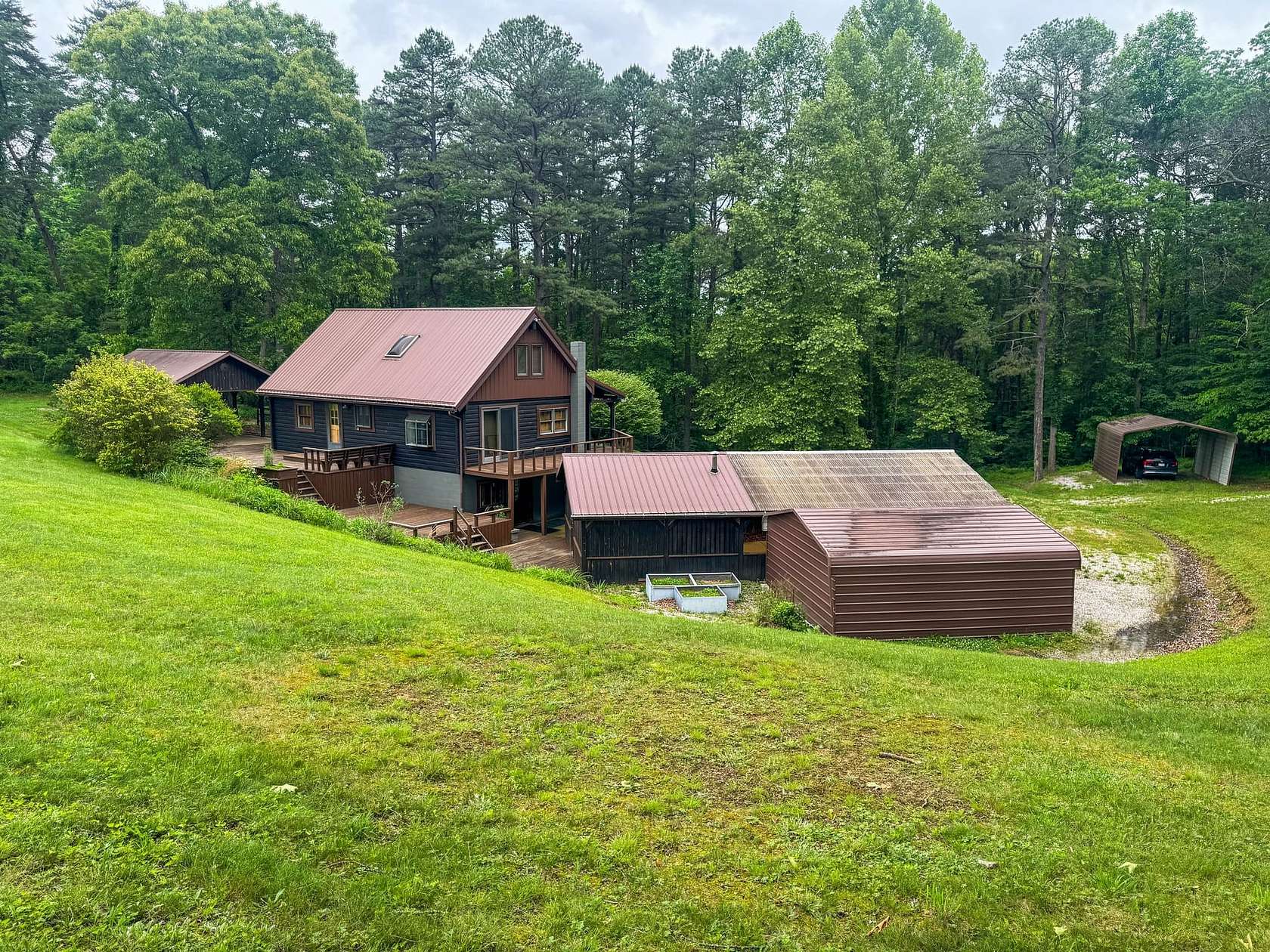 184 Acres of Recreational Land with Home for Sale in Long Bottom, Ohio