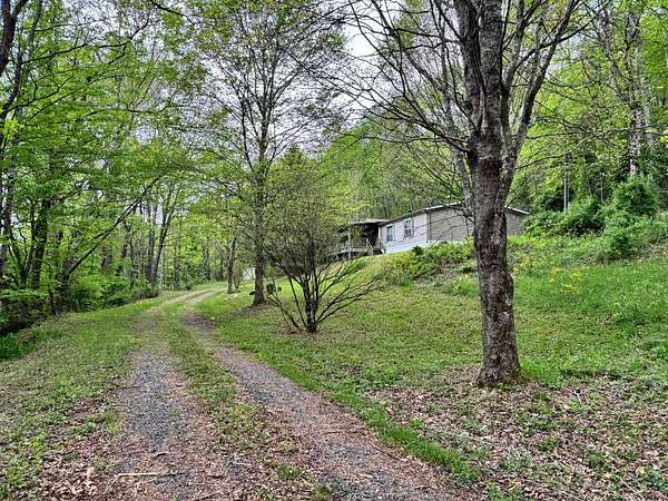 17.3 Acres of Recreational Land with Home for Sale in Newland, North Carolina