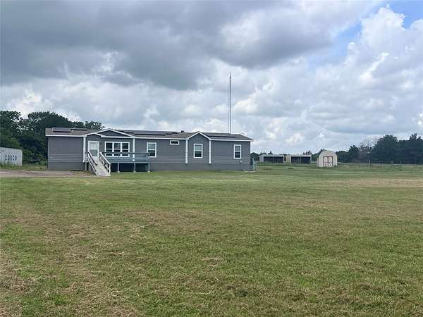8.4 Acres of Land with Home for Lease in Trenton, Texas