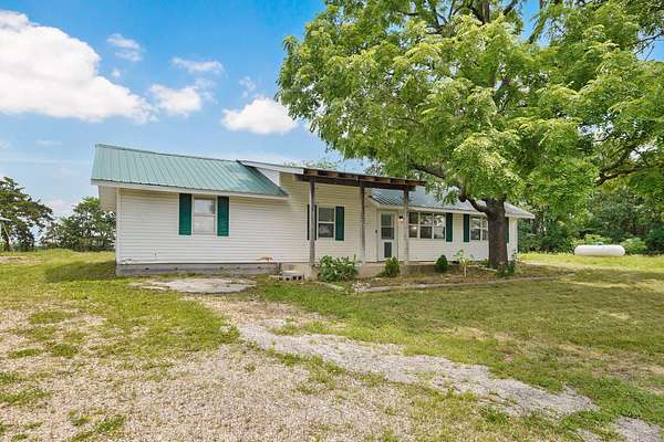 39 Acres of Land with Home for Sale in Richland, Missouri