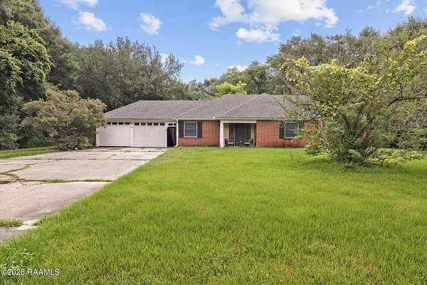 12.9 Acres of Land with Home for Sale in Scott, Louisiana