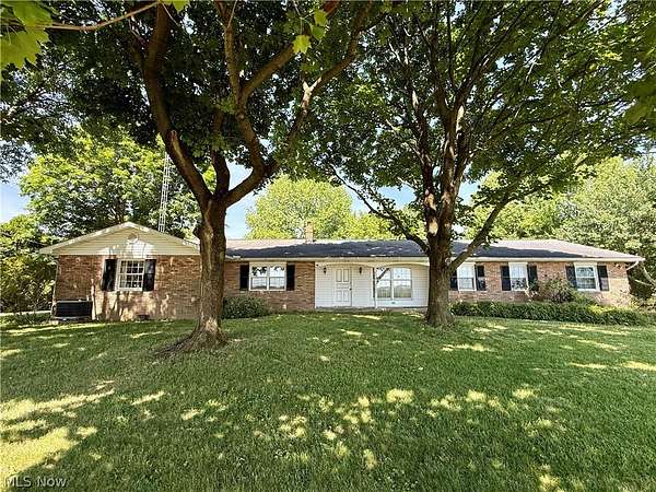 6.76 Acres of Land with Home for Sale in Louisville, Ohio